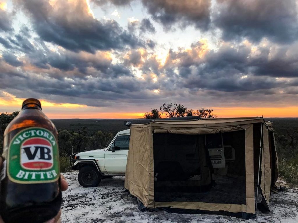 landcruiser troopy with canopy awning to keep mosquitos away